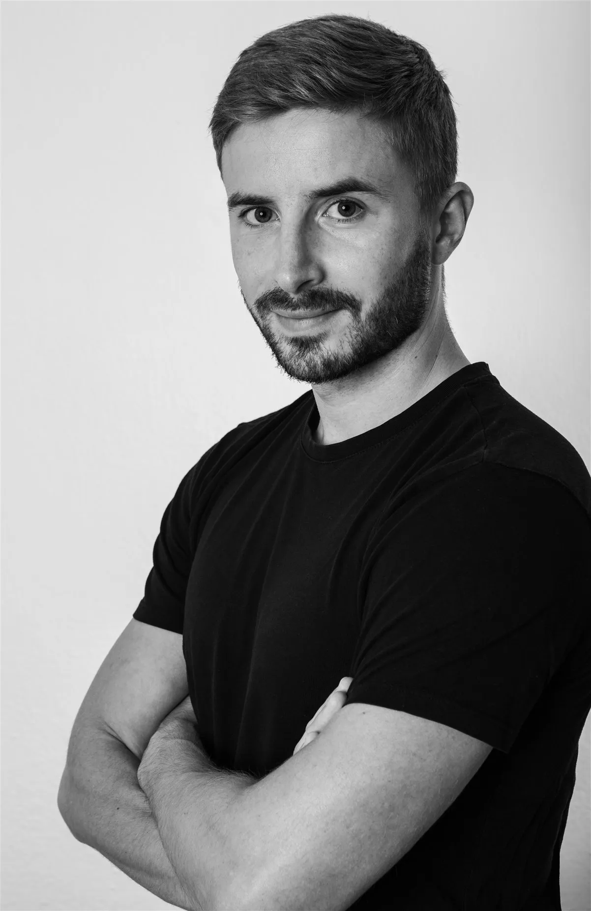 Aleš Prijatelj with arms crossed
